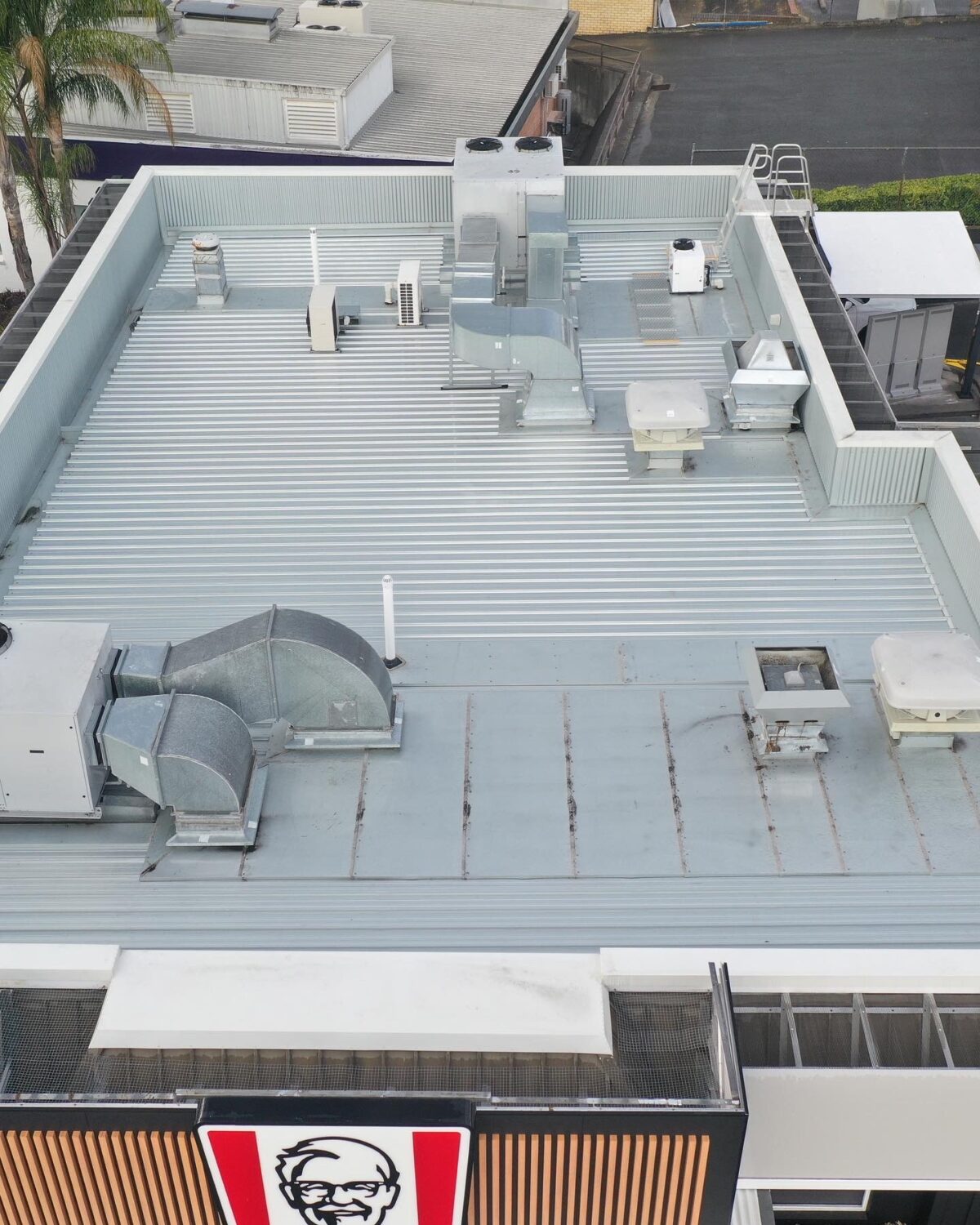View of a building taken during the day from a rooftop