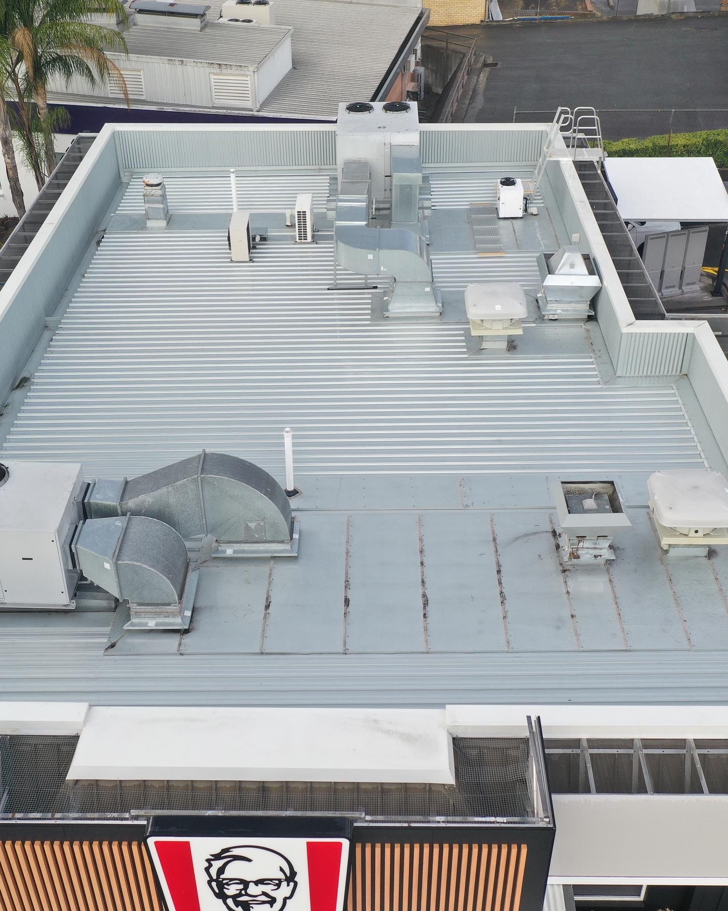 View of a building taken during the day from a rooftop